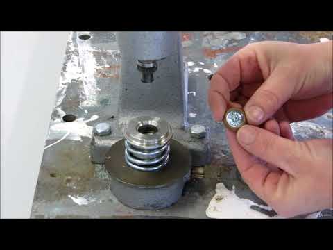 The button machine. Making a genuine leather button. Part 6